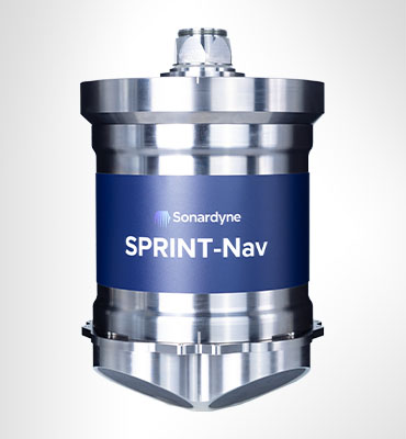 A cylindrical metallic and dark blue Sonardyne SPRINT-Nav device with a hexagonal connector at the top and four conical sections at the bottom.