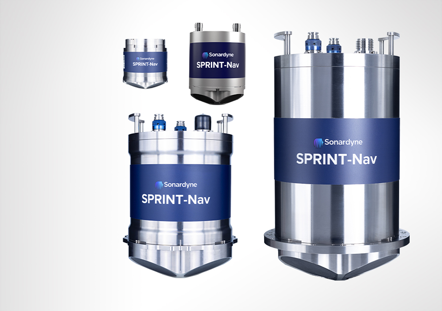 Four silver and blue cylindrical Sonardyne SPRINT-Nav devices of varying sizes, arranged on a light grey background.