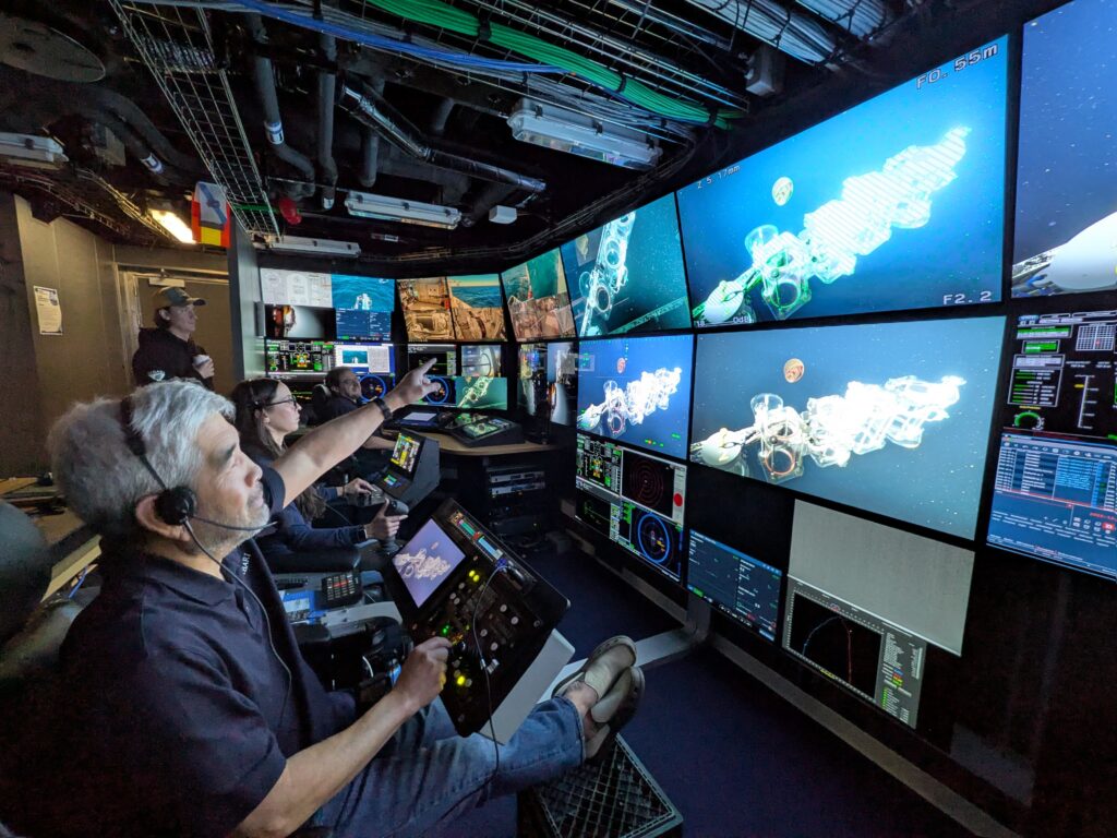 Researchers explore the deep sea using ROV Doc Ricketts in the control room of MBARI's flagship research vessel David Packard.