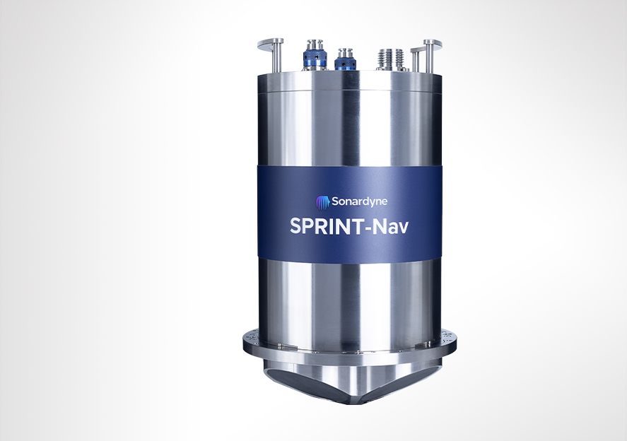 A cylindrical metallic device with a blue band labeled 'Sonardyne SPRINT-Nav' against a grey background.